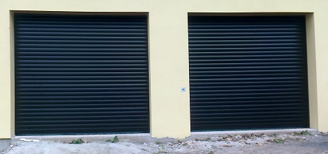 Picture of a pair of installed Aluroll insulated roller doors